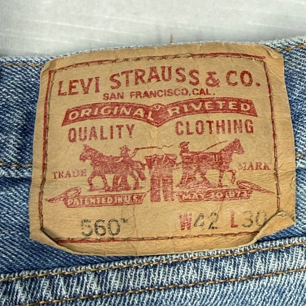 Levi's 560 Comfort Fit Jeans Mens 42x30 Blue Denim Light Wash Distressed Stained